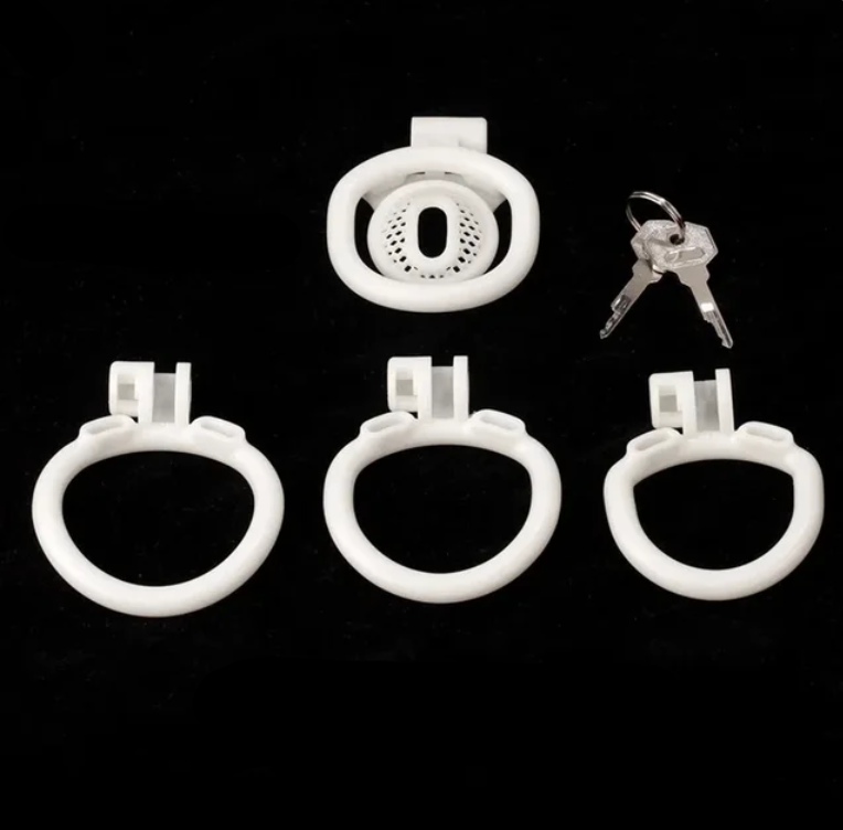 small negative chastity cage with 4 penis rings